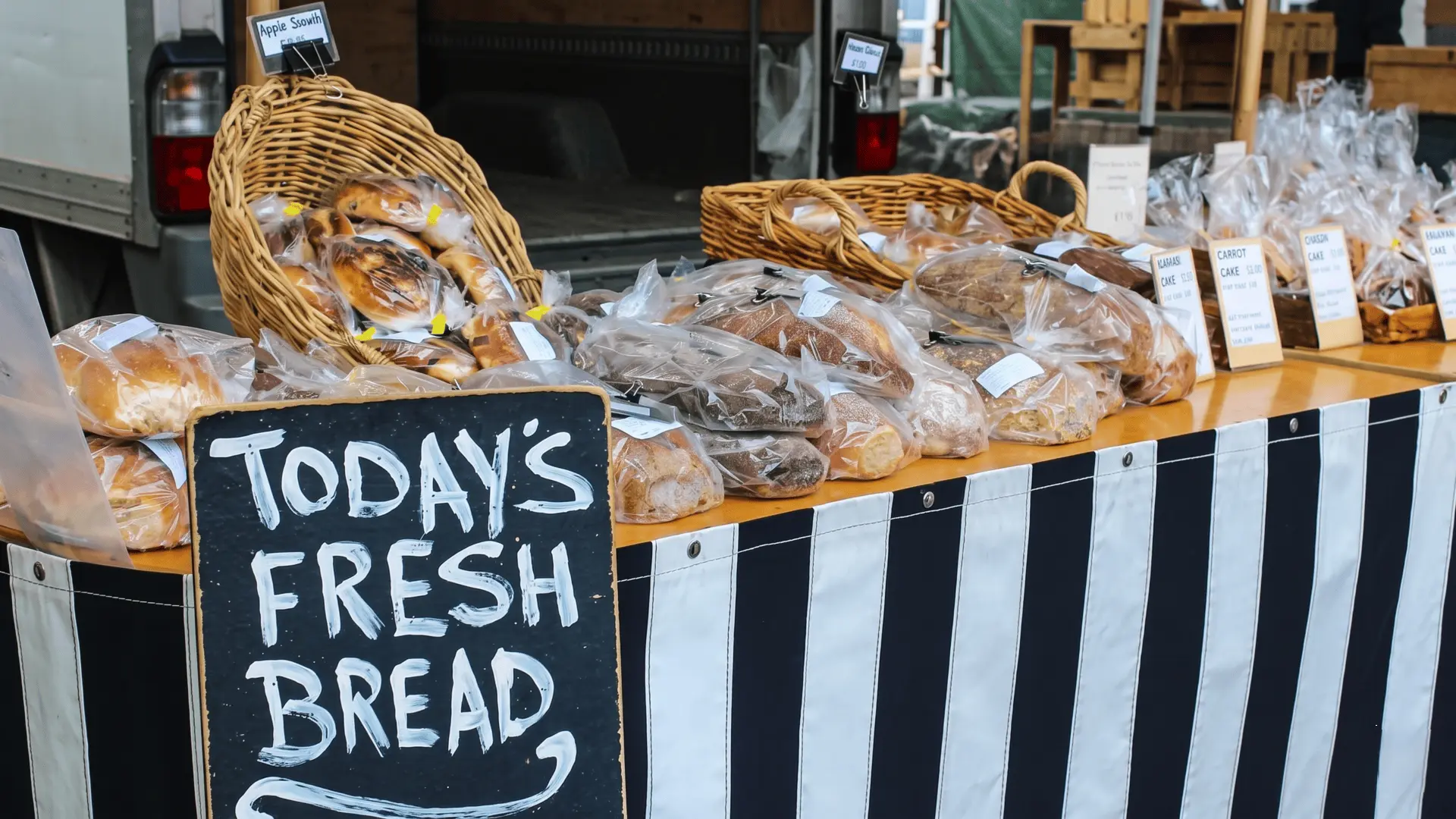Vibrant Salamanca Market in Hobart with local crafts, food stalls, and historic sandstone buildings