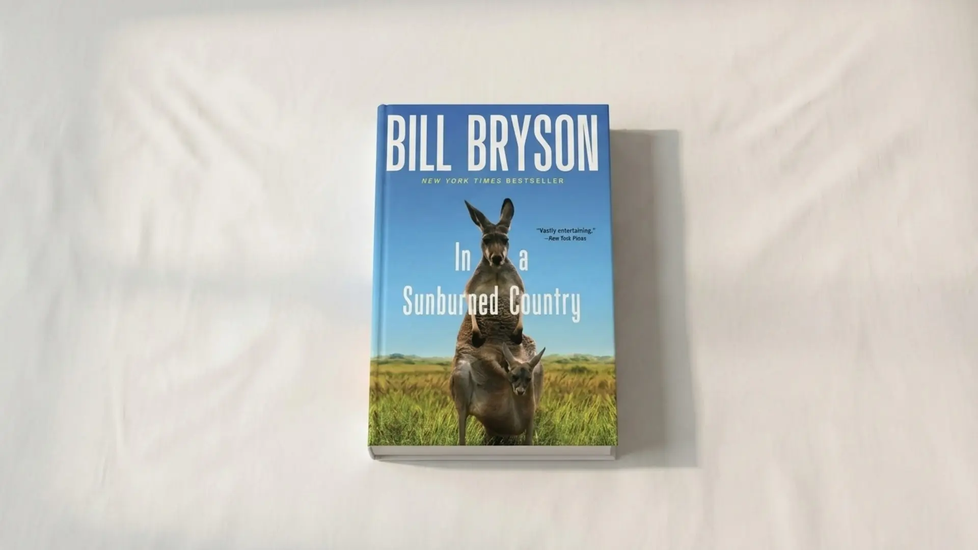 In a Sunburned Country by Bill Bryson, a humorous travel book about exploring Australia and its landscapes and wildlife