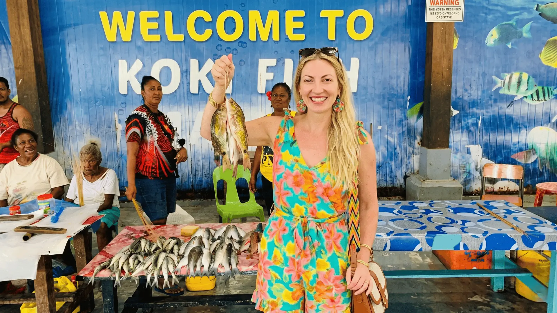 Local people buying fresh groceries at the bustling Koki Market in Port Moresby