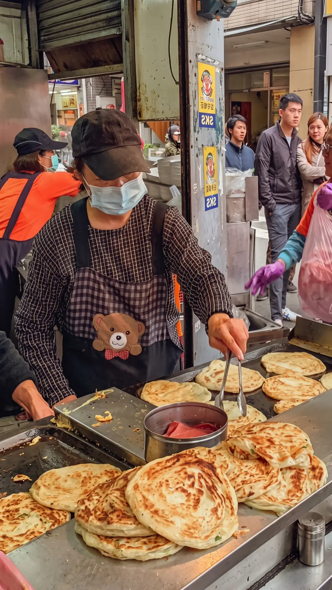 Freshly made golden Taiwanese scallion pancakes (cong you bing) with crispy layers and green onions
